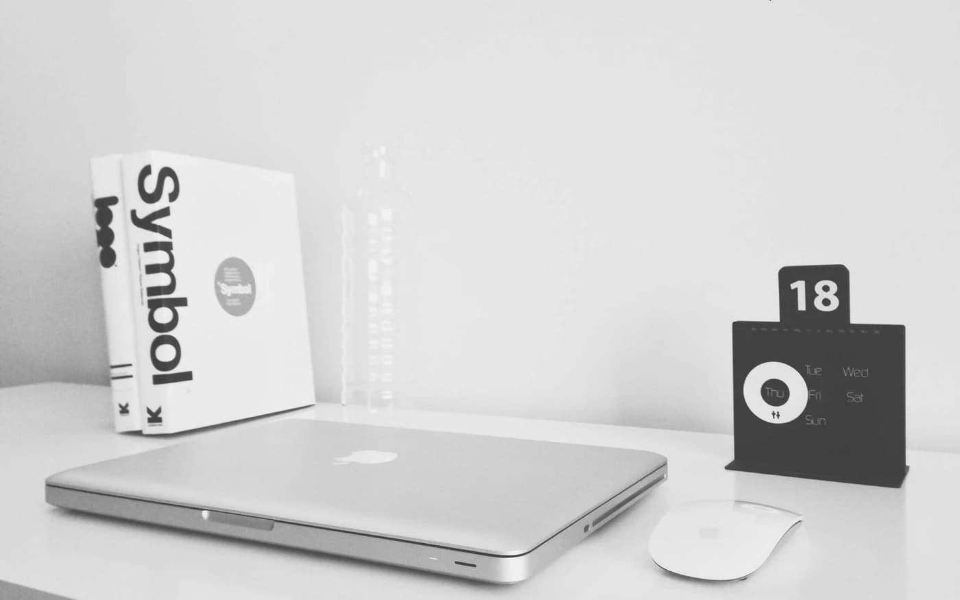 [demo] Laptop and phone on a white desk